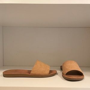 Tan slip on sandals